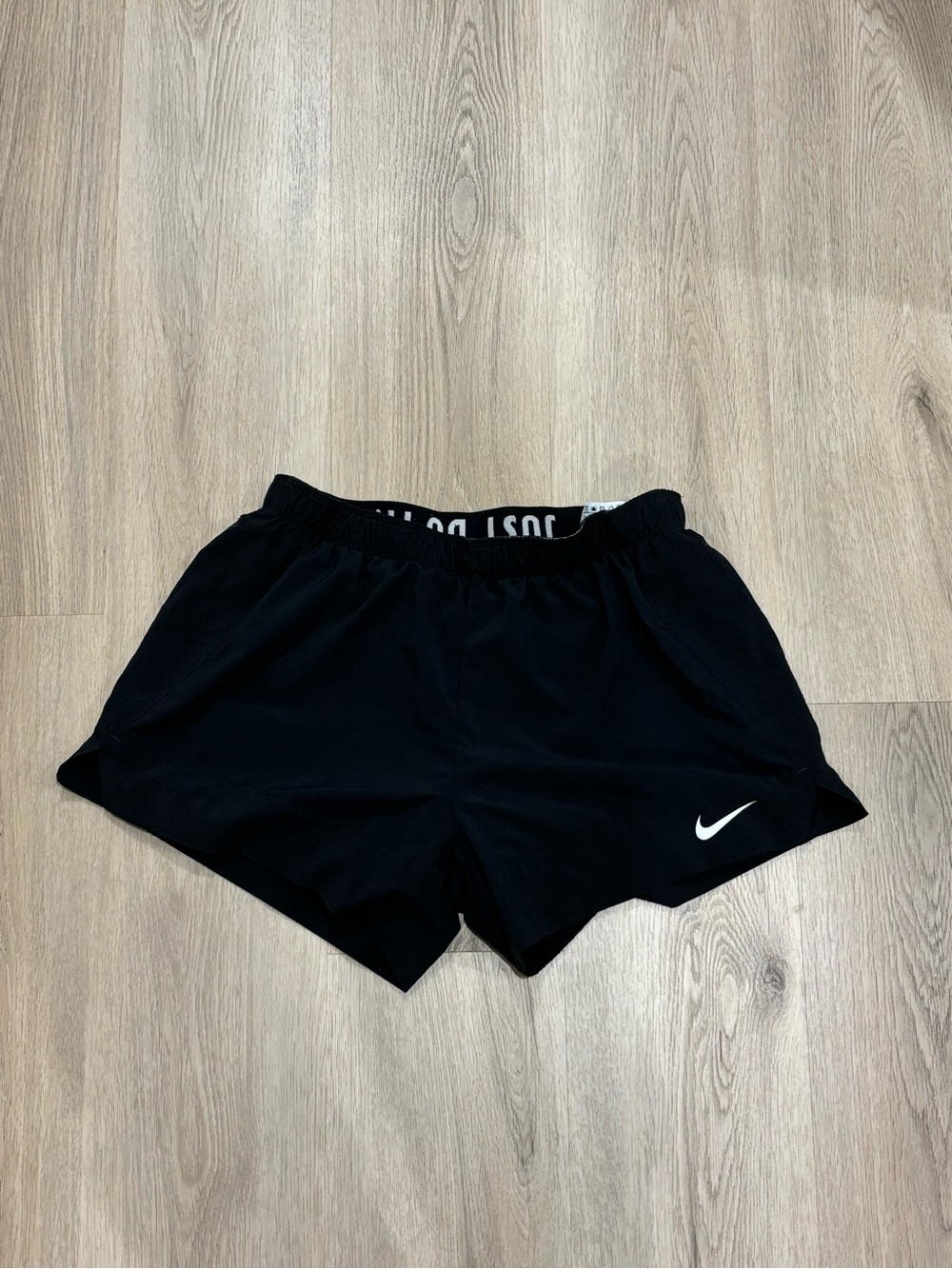 Nike Black Women’s Athletic Running Shorts with White Swoosh